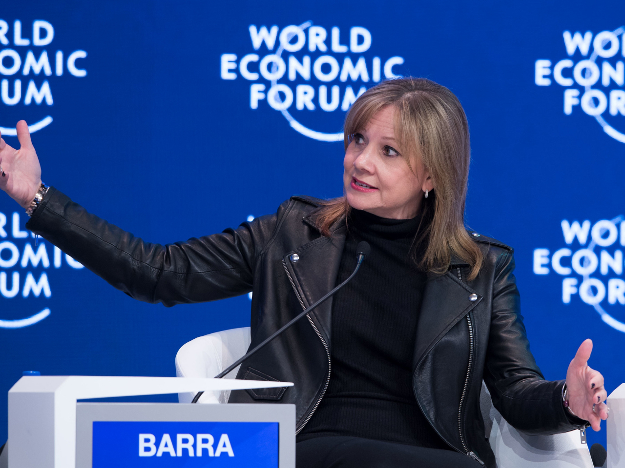 A woman speaking at a World Economic Forum event